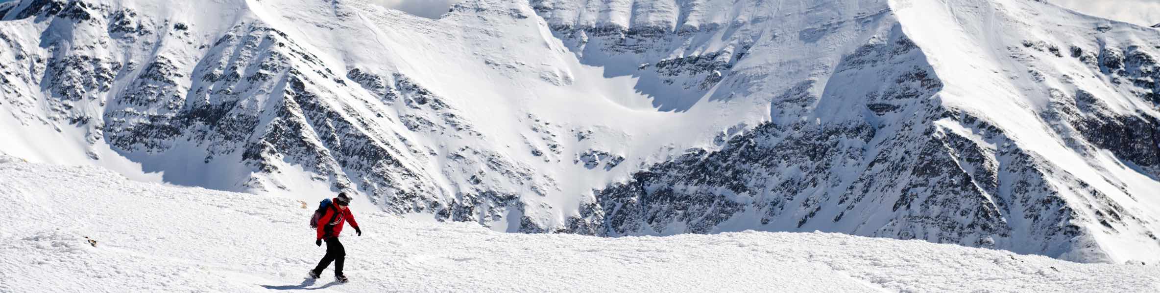 hero-azl-man-walking-across-mountains