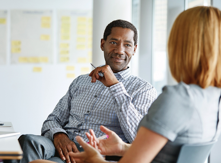 Two people in a meeting