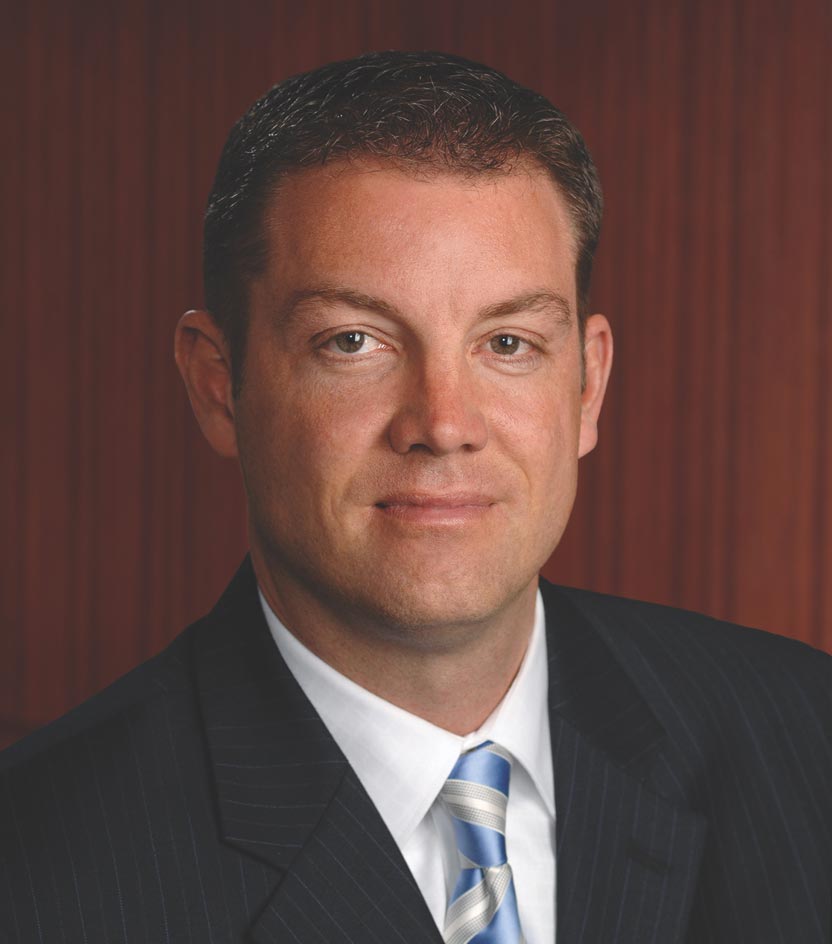 Headshot of ERIC THOMES, Chief Distribution Officer