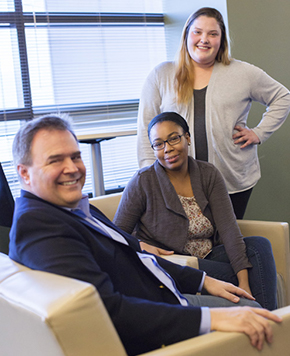 Allianz Life Contact Center employees looking into camera